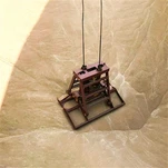 Daru kagylógot megragadja a vödröt